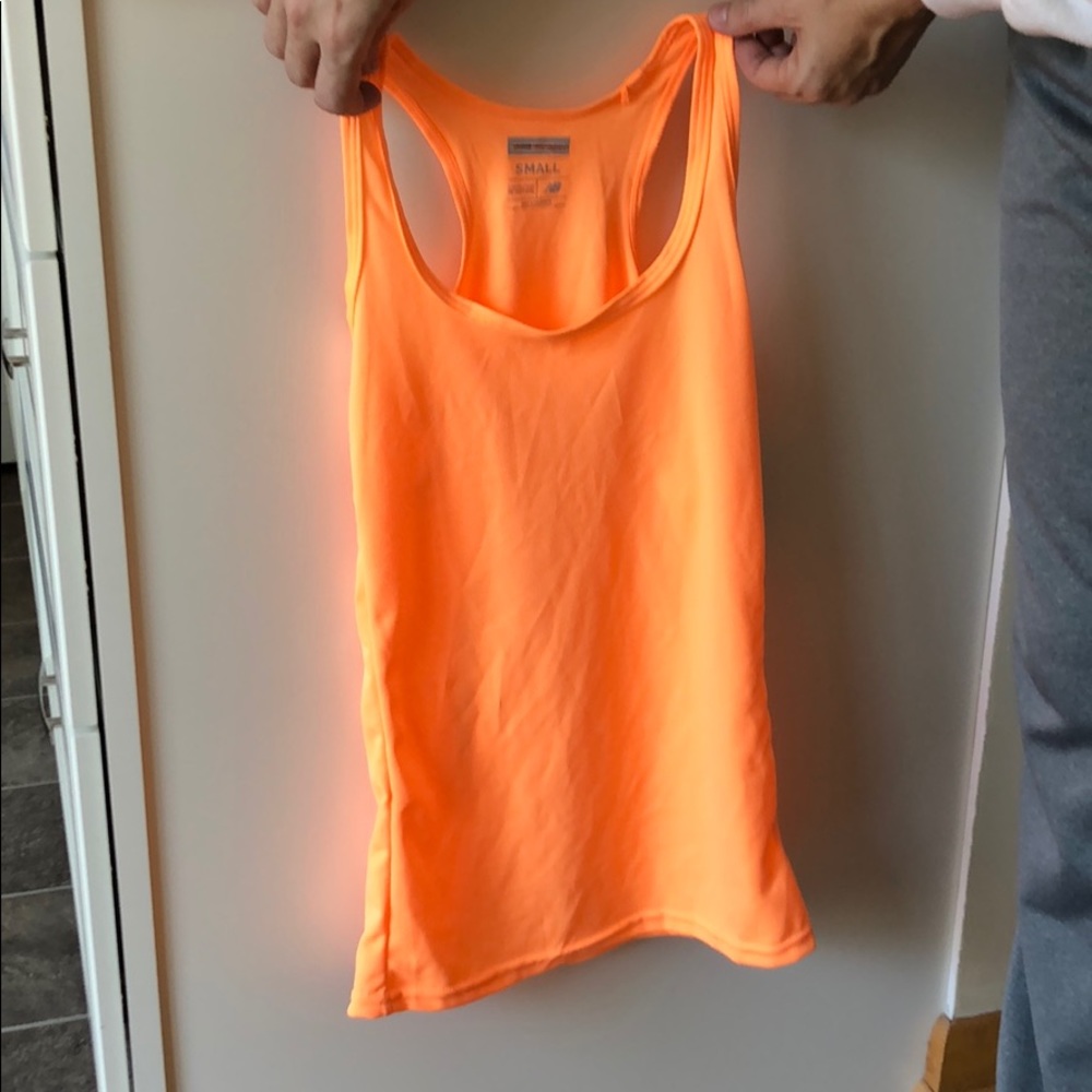 Neon orange tank top, size small, new balance.